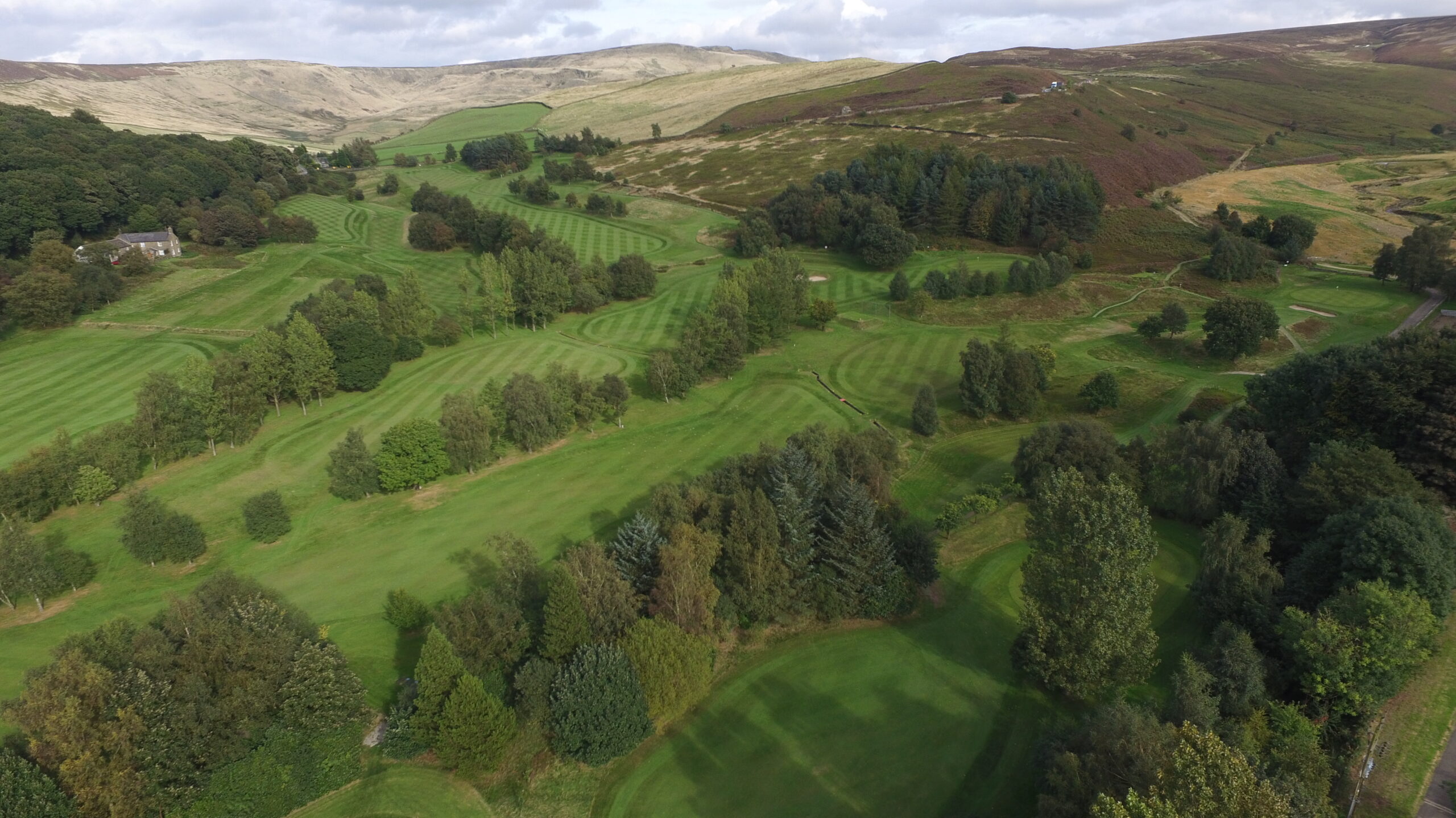 Aerial view of Woodcock Farm and the surrounding golf course